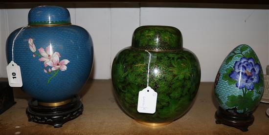 Two Chinese cloisonne ginger jars and covers (one with hardwood stand) and a similar egg on stand